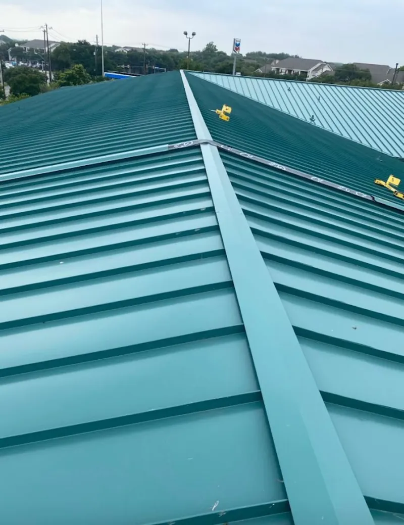 Green commercial metal roof ridge and valley for Metal Roof Repair in Pembroke